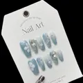 Uñas postizas hechas a mano degradado azul claro con pétalos 3D y copo de nieve de cristal - XS / Margarita de Cristal