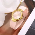 Elegant women's quartz watch with pink silicone strap and crystal markers on gold case - Pink