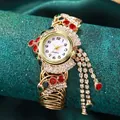 Luxury gold quartz watch with rhinestones and elegant tassel on textured background - Red Green Rhinestone
