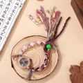 Detail of bohemian beaded watch with rose gold rhinestone dial and pink floral beads - Black