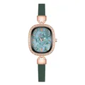 Macro view of oval rose gold watch with cyan marble dial and diamond-set bezel - Shell Roman Green