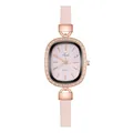 Macro shot of rose gold oval case with rhinestones and pink leather strap on Tadi watch - Numeral Pink