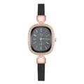 Detailed close-up of oval rose gold watch case with crystal bezel and grey sunray dial - Number Black