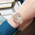 Elegant ladies quartz watch with diamond bezel and cream leather strap on wrist - Apricot Gold