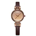 Dettaglio del quadrante orologio oro rosa con motivo sunburst e accenti di cristallo - caffè