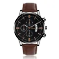 Detailed view of men's chronograph watch with rose gold indices and dark brown leather strap - Black Face Brown Strap