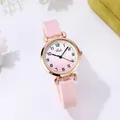 Detail of pink silicone strap and rose gold case on women's gradient dial watch - Silicone Strap (Tadi) / Pink