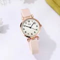 Close-up of minimalist rose gold watch with pink silicone strap and Tadi logo dial - Silicone Strap (Tadi) / Beige