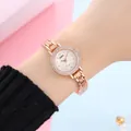 Elegant rose gold women's quartz watch with diamond bezel and wave texture dial - White Spiral Face