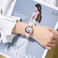 Detail of minimalist women's watch with gradient dial and white strap on a wrist - Silicone Strap (Tadi) / White