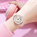 Close-up of pink leather strap watch with butterfly dial and champagne gold finish - Khaki Leather