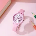 Pink quartz watch for women with butterfly dial and leather strap against office props - Pink Leather