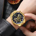 Macro detail of the Ganwa gold engraved steel watch featuring a black three-eye dial design - Gold Black