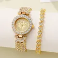 Elegantes Set aus goldener Uhr und Herzarmband mit Kristallen und floralem Zifferblatt - Blumen Uhr Und Armband Set