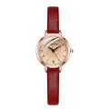 Detailed macro view of retro burgundy leather strap and rose gold bezel on quartz watch - Red