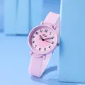 Detail of light pink watch with Arabic numerals on dial and soft silicone strap - Pink Silicone Strap