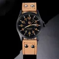 Detail of SOKI quartz watch showing black dial, date window and brown leather rivet strap - Khaki