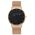 Close-up of Geneva rose gold mesh watch strap and dark black dial with blue markers - Rose Gold Blue
