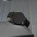 SOKI men's black business sport watch with leather strap and red hands on a textured background - Black with Red Hands