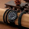 Black SOKI men's watch with nylon strap and three matching bracelets on a rustic bamboo mat - Black