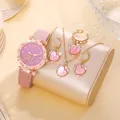 Set orologio rosa da donna con collana a cuore, orecchini e anello su supporto oro - Set Cuore Rosa 1