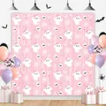 Pink Halloween backdrop with cute white ghosts, skeletons, and spider webs for party decor - Ghost / Pink
