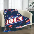 Independence Day flannel blanket with 4th of July patterns draped on a white sofa - 100*150cm / Independence Day Style 2