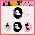Detail of 12 inch pink and black Halloween balloons featuring ghost and owl prints - Latex Balloon Combination