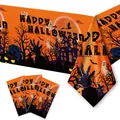 Détail de la nappe et des serviettes d'Halloween avec citrouilles et châteaux hantés - Nappe Halloween Orange