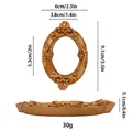 Gouden Barok miniatuur fotolijst ovaal met bloemig snijwerk en afmetingen erop - Europees Ovaal Reliëf Stijl / Europees Goud
