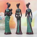 Set of three resin African tribal figures in traditional dress for home decor - Green Zirconia Set