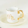 Detail of white ceramic mug with gold rim, Mr lettering and elegant gold handle - Mr Pattern / Gold MR