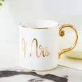 Detail of Mrs. ceramic mug with elegant gold handle and luxury gilded rim accents - Mrs Pattern / Gold MRS