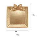 Detalle de bandeja de joyería dorada con lazo, dimensiones de 9,5 cm y peso de 110 g - Cuadrado / Cuadrado Dorado
