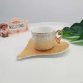 Service à café avec soucoupe, motif géométrique jaune et anse en forme d'aile d'ange dorée - Style Losange A