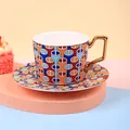 Ceramic coffee cup and saucer set with colorful geometric chain pattern and gold handle - Cup And Saucer Cfbd0063 / Approximately 250ml