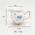 Ceramic milk pitcher with heart patterns and gold trim, 190ml capacity with 8cm height - Milk Pitcher / White Heart