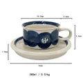 French vintage ceramic coffee cup and saucer set with dark blue floral patterns - Anemone Blue