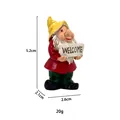 Close-up of garden gnome resin statue with Welcome sign and dimension measurements - Welcome Gnome