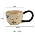 Cartoon ceramic mug in cream yellow with large black handle and animal illustration - Colorful Cartoon Head Cream