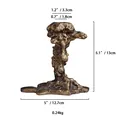 Retro bronze candle holder with irregular fluid design measuring 13cm in height - Bronze