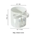 Tazza 350ml in ceramica bianca con fiocco 3D e finitura perlata iridescente - Bianco