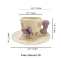 Tazza da caffè in ceramica crema con manico a fiocco viola e motivi floreali con piattino - Tazza e Piattino Farfalla Viola