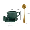 Artistic face ceramic coffee cup and saucer set in matte dark green finish with dimensions - Green