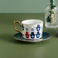 Set tazzina da caffè in ceramica con mano di Fatima, manico dorato e piattino blu scuro - Stile Floreale Blu Mano Di Fatima / Mano Di Fatima E Malocchio Bianco
