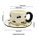 Ceramic cherry coffee cup and saucer set with 320ml capacity and dimension details - Black Cherry