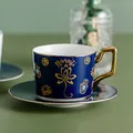 Set tazzina da caffè in ceramica blu scuro con scritta dorata Namaste e decoro Hamsa - Stile Blu Scuro Namaste / Motivo Loto Namaste