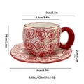 Ceramic coffee cup and saucer set featuring red hand-painted floral pattern and 320ml capacity - Rose