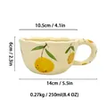 Hand-pinched ceramic mug with lemon patterns, scalloped rim and 250ml capacity info - D Lemon Style