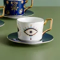 Set tazzina caffè in ceramica con motivo malocchio e manico dorato stile boho - Misto Mano Di Fatima E Malocchio